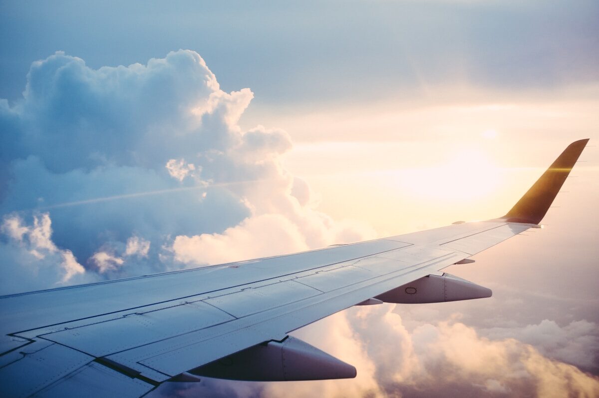 Commercial airplane wing view from passenger window